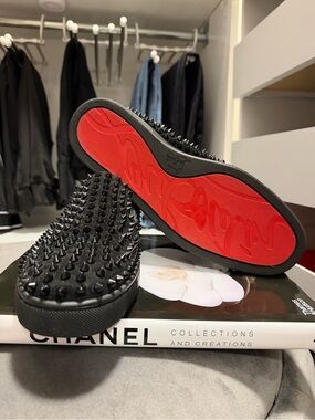 Christian Louboutin Men's Black Spiked Slip-Ons with Red Soles